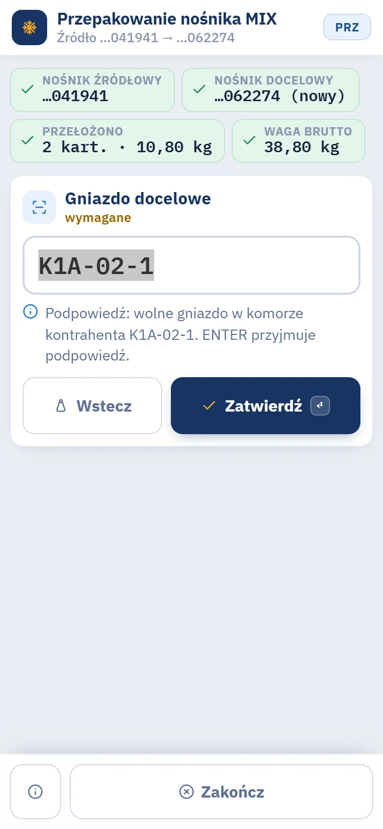 Terminal, krok Gniazdo docelowe z podpowiedzią K1A-02-1 w komorze kontrahenta oraz przyciski Wstecz i Zatwierdź